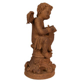 Rozsdabarna színű, antikolt felületű angyal figura.